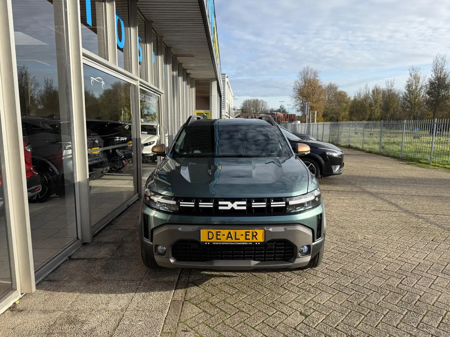 Dacia Duster 1.6 Hybrid 140 Extreme 7p. / ACHTERUITRIJCAMERA / Groen - 2