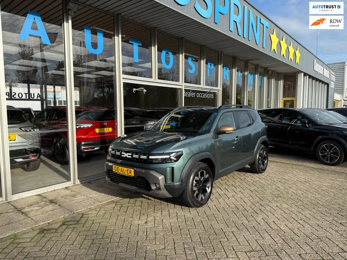 Dacia Duster 1.6 Hybrid 140 Extreme 7p. / ACHTERUITRIJCAMERA / Groen - 1