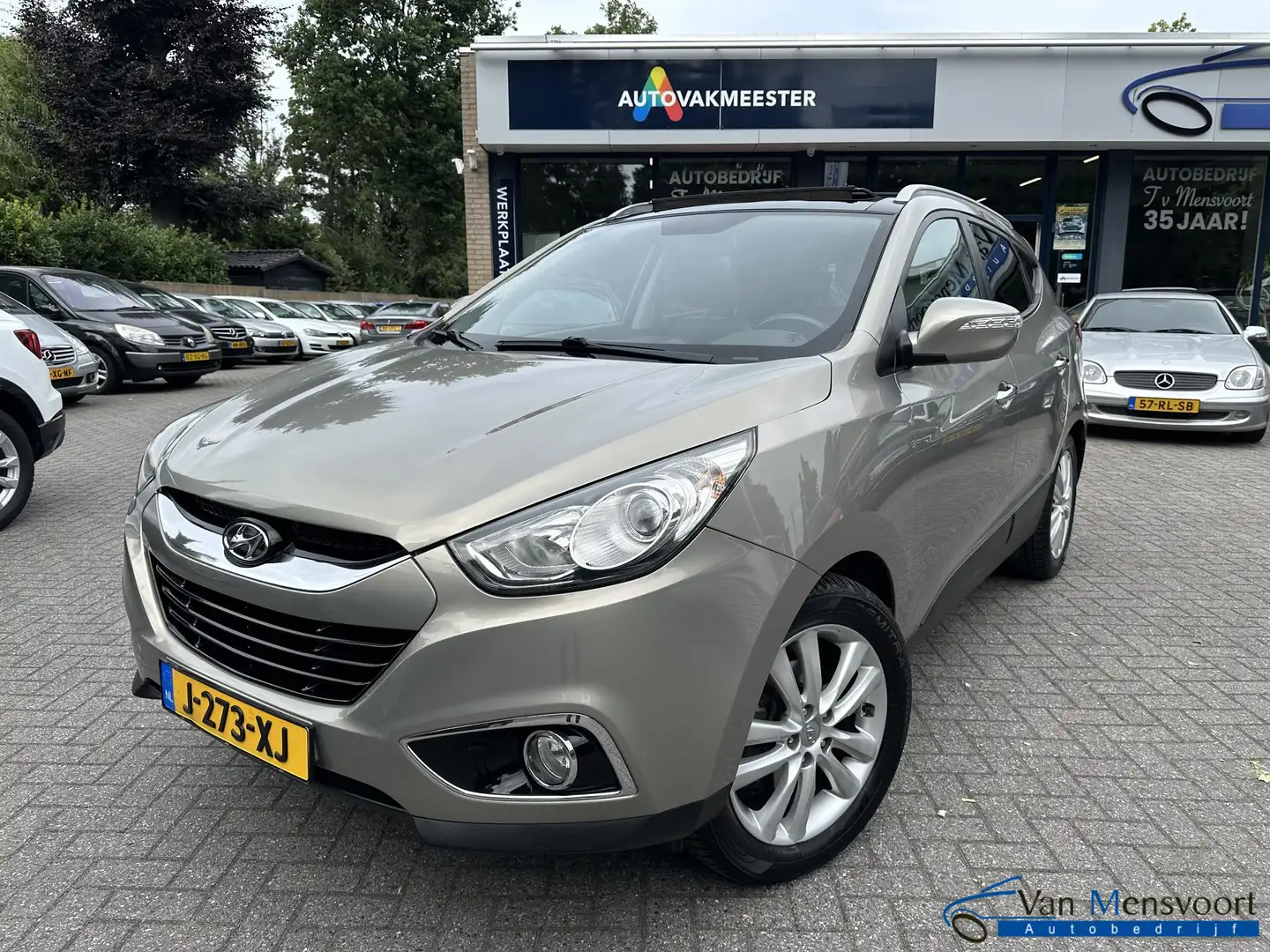 Hyundai iX35 2.0i Automaat 4WD i-Catcher Leder|Navi|Panorama|Ca Grijs - 1