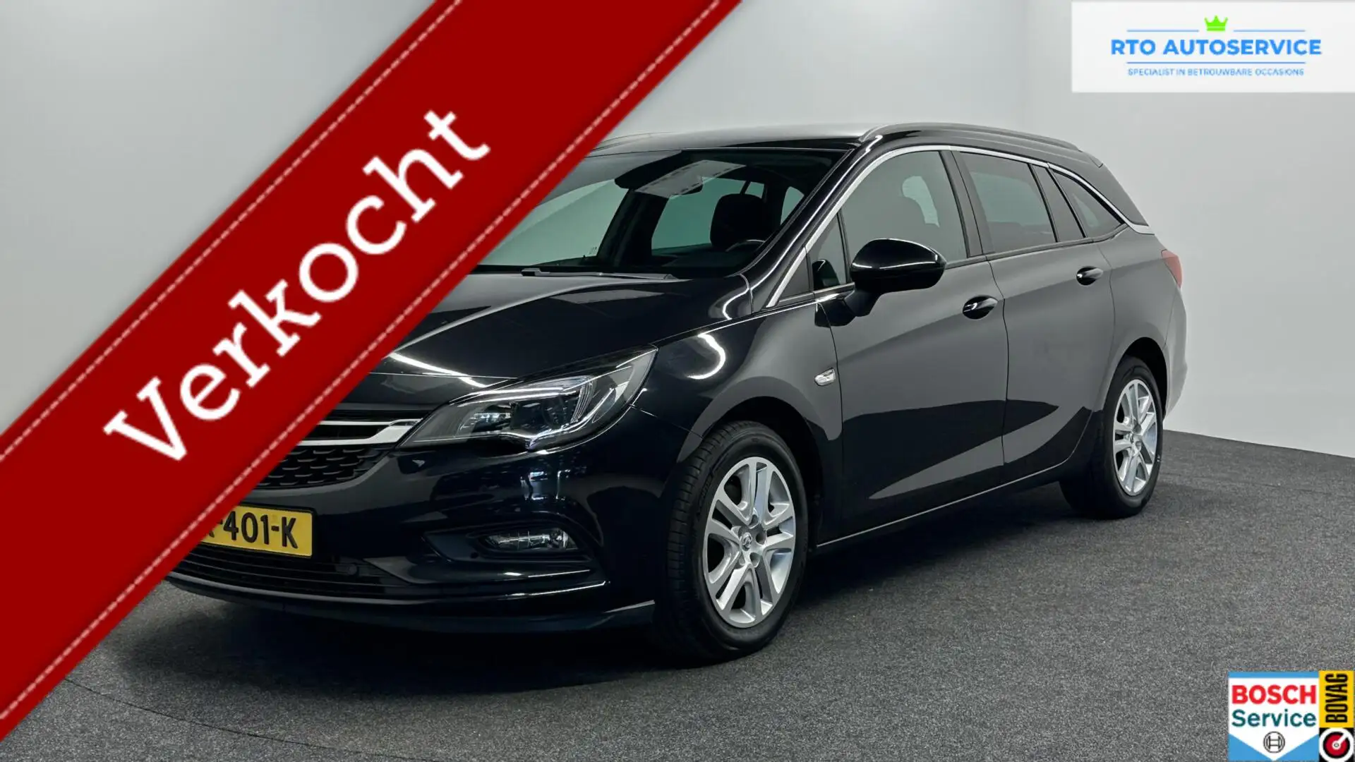 Opel Astra Sports Tourer 1.6 CDTI Business+ NAVIGATIE CRUISE. Zwart - 1
