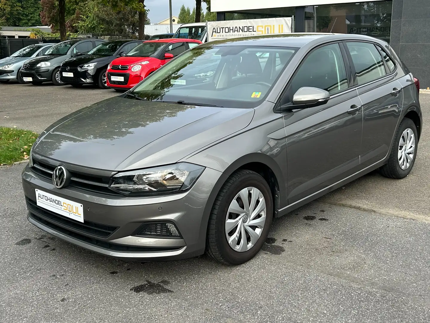 Volkswagen Polo 1.0i 2019, 66530km, Airco, PDC, Crui ctr, Garantie Gris - 1