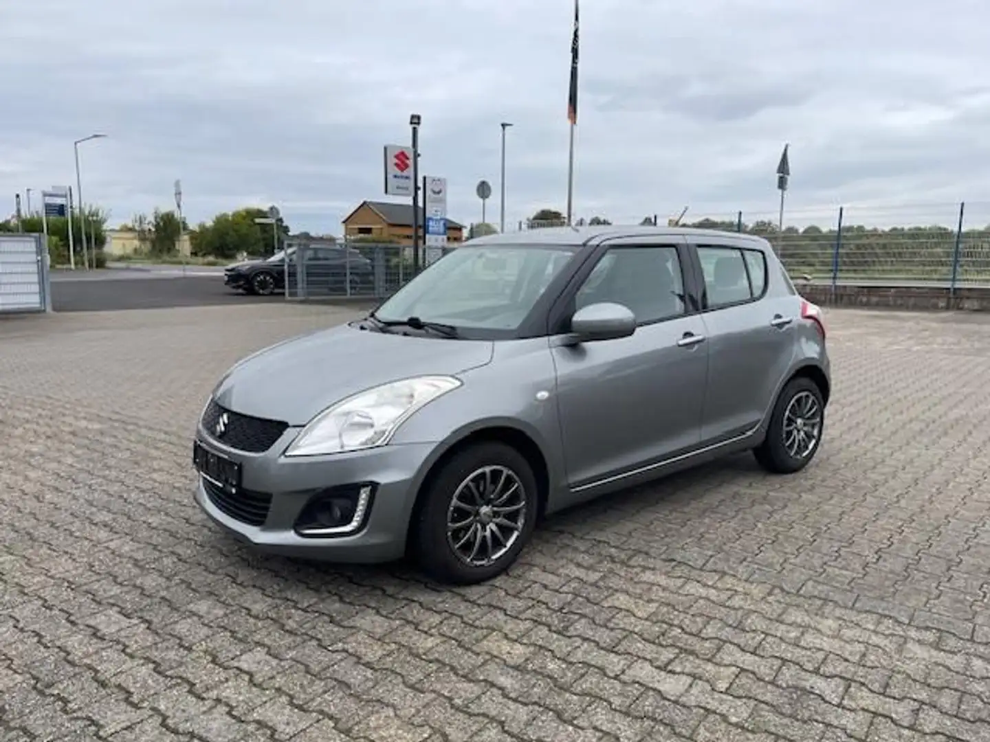 Suzuki Swift Grau - 1