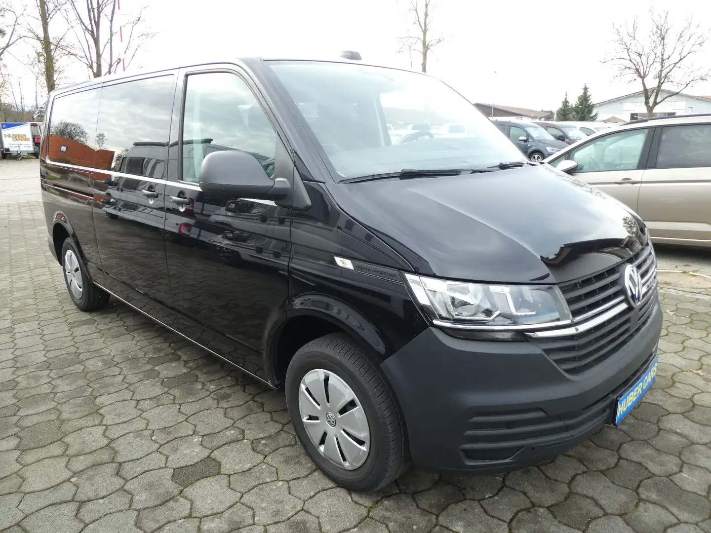 Volkswagen T6 Kombi T6.1 Kombi Lang DSG Klima+SHZ+Tempom+9-Sitzer Černá - 1