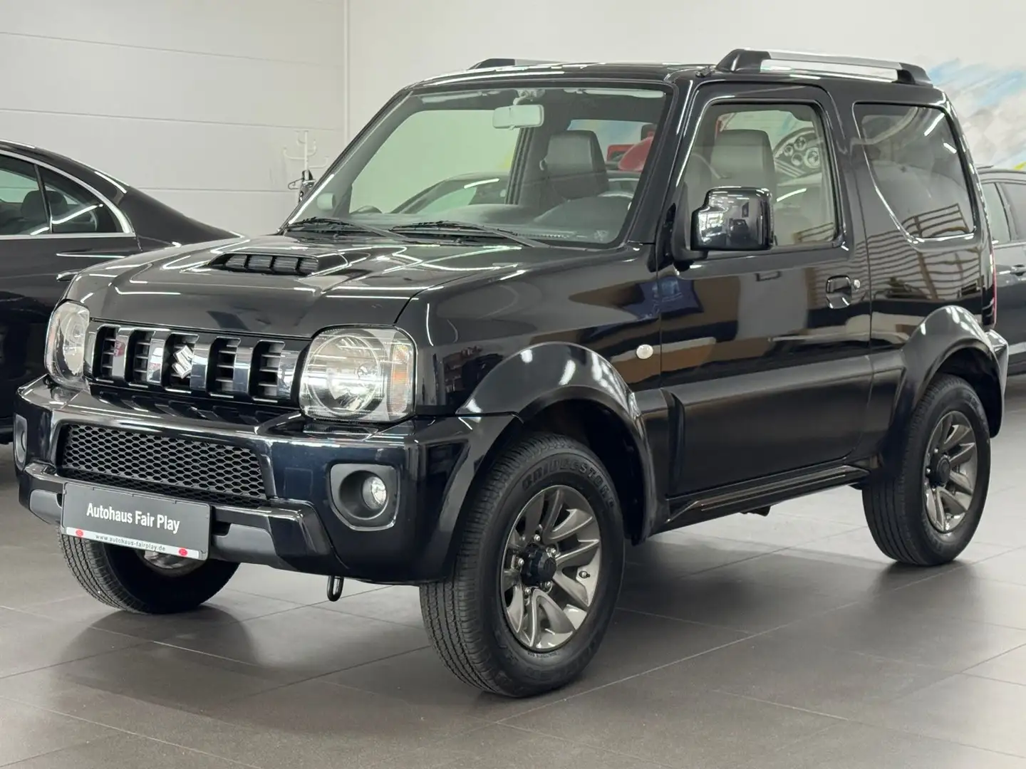 Suzuki Jimny Ranger Club Lim. 1.HAND/U-FREI/TOPZUSTAND! Schwarz - 1