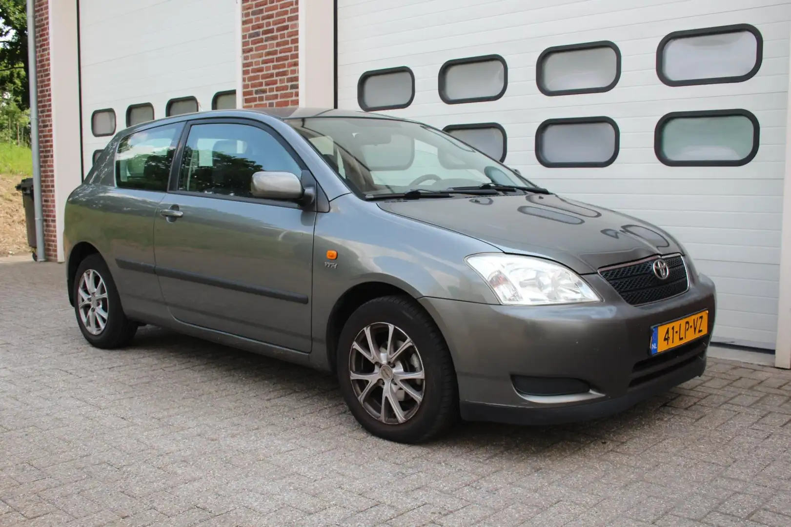 Toyota Corolla 1.4 VVT-i Linea Terra 3-Deurs * Airco / Nap * Gri - 1