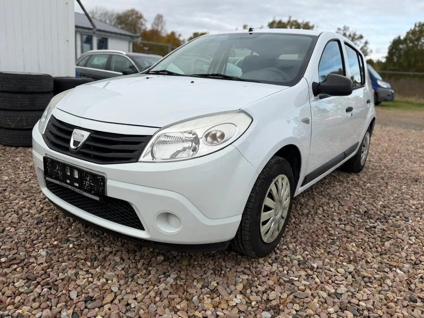 Dacia Sandero 1.2 *Elektro-Paket*Klima*1.Hand*TÜV 08/26* Weiß - 1