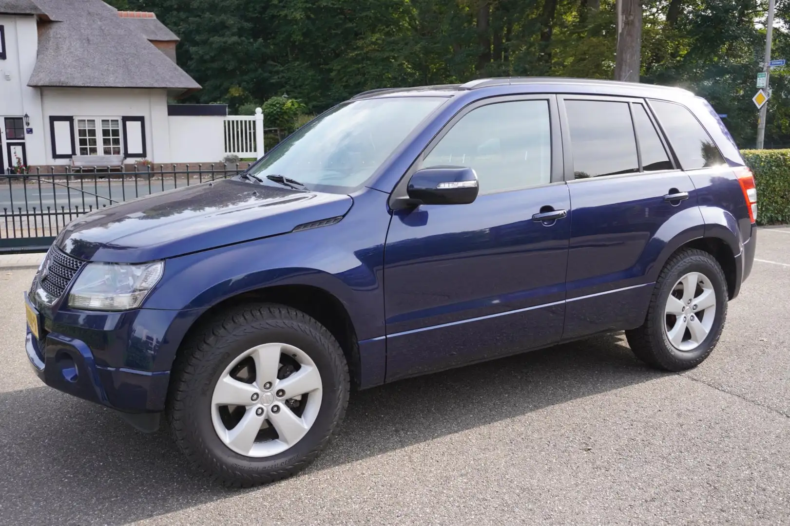 Suzuki Grand Vitara 2.4 Exclusive Airco Trekhaak Blu/Azzurro - 1