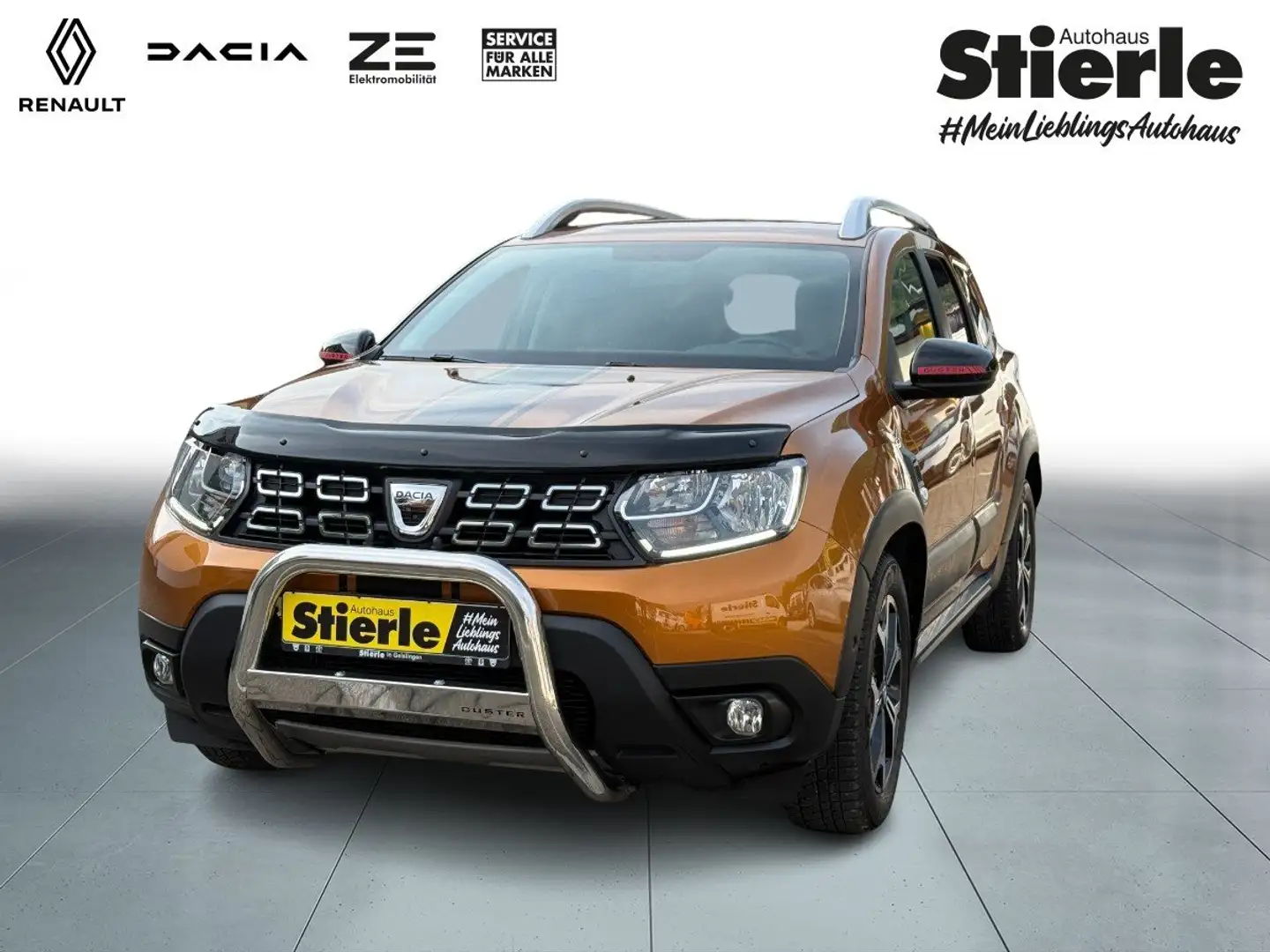 Dacia Duster CELEBRATION TCE 150 4WD GPF/KAMERA/PDC/KLIMA/AHK Orange - 1
