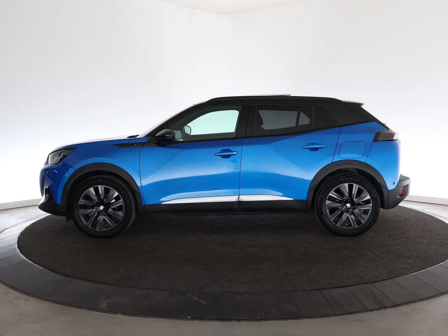 Peugeot e-2008 EV GT Première | SoH 100% | Panoramadak | Camera | Bleu - 2