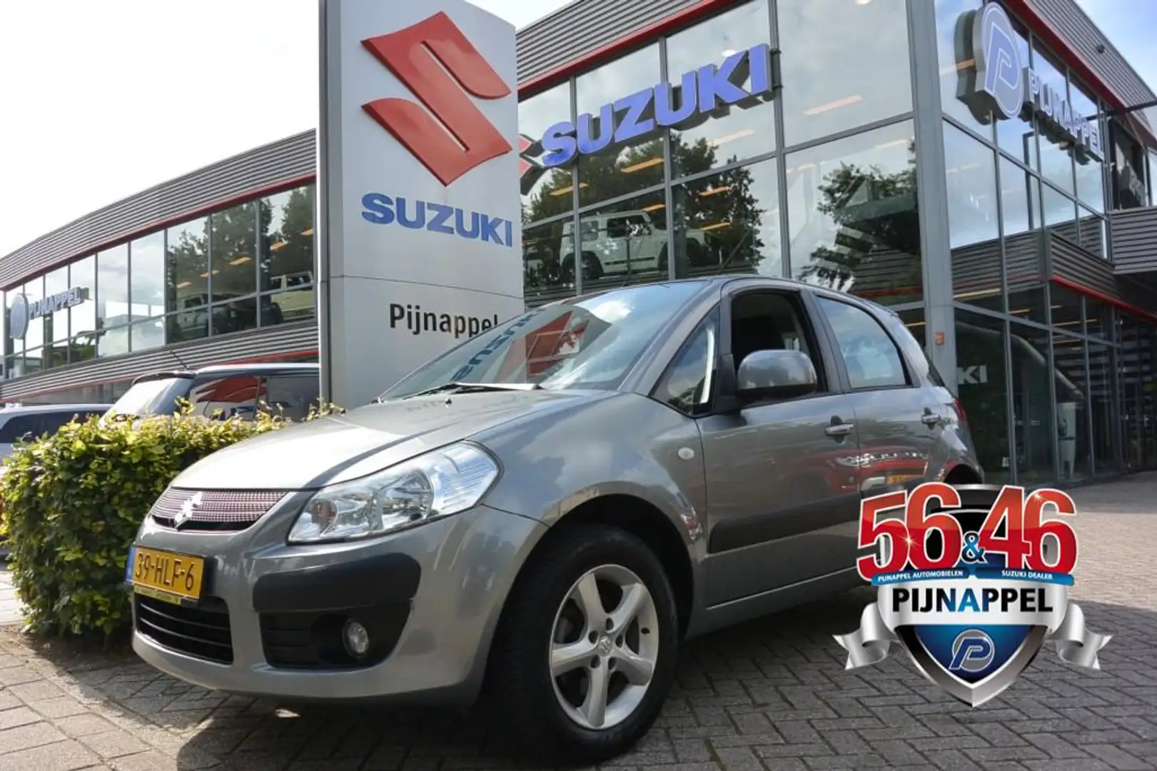 Suzuki SX4 1.6 Exclusive 5-deurs Airco Šedá - 1
