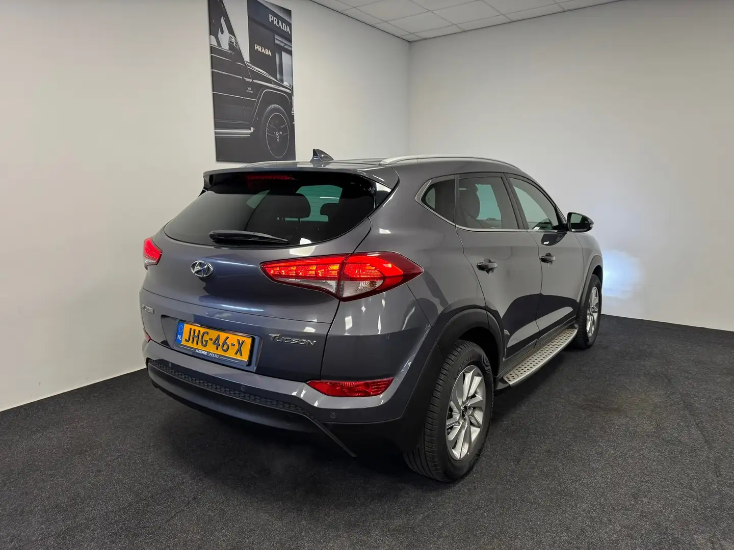 Hyundai TUCSON 1.6 GDi Premium // Leder // Keyless // Lane Grijs - 2