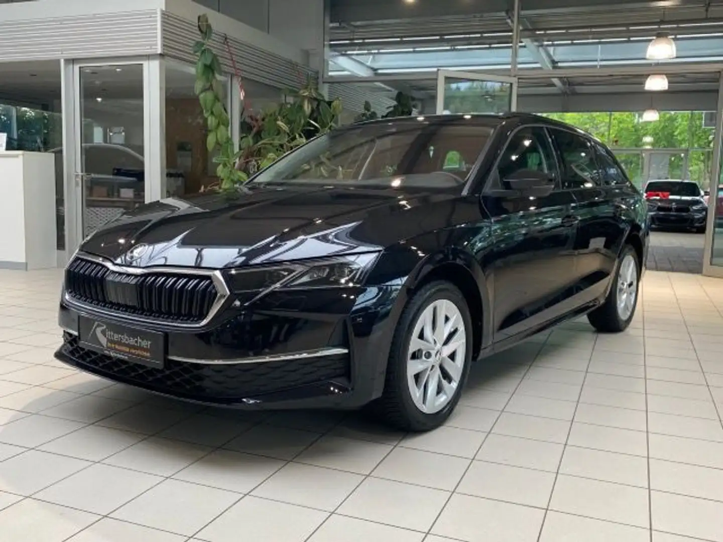 Skoda Octavia Combi 2.0 TDI DSG Selection Navi Kamera Zwart - 2