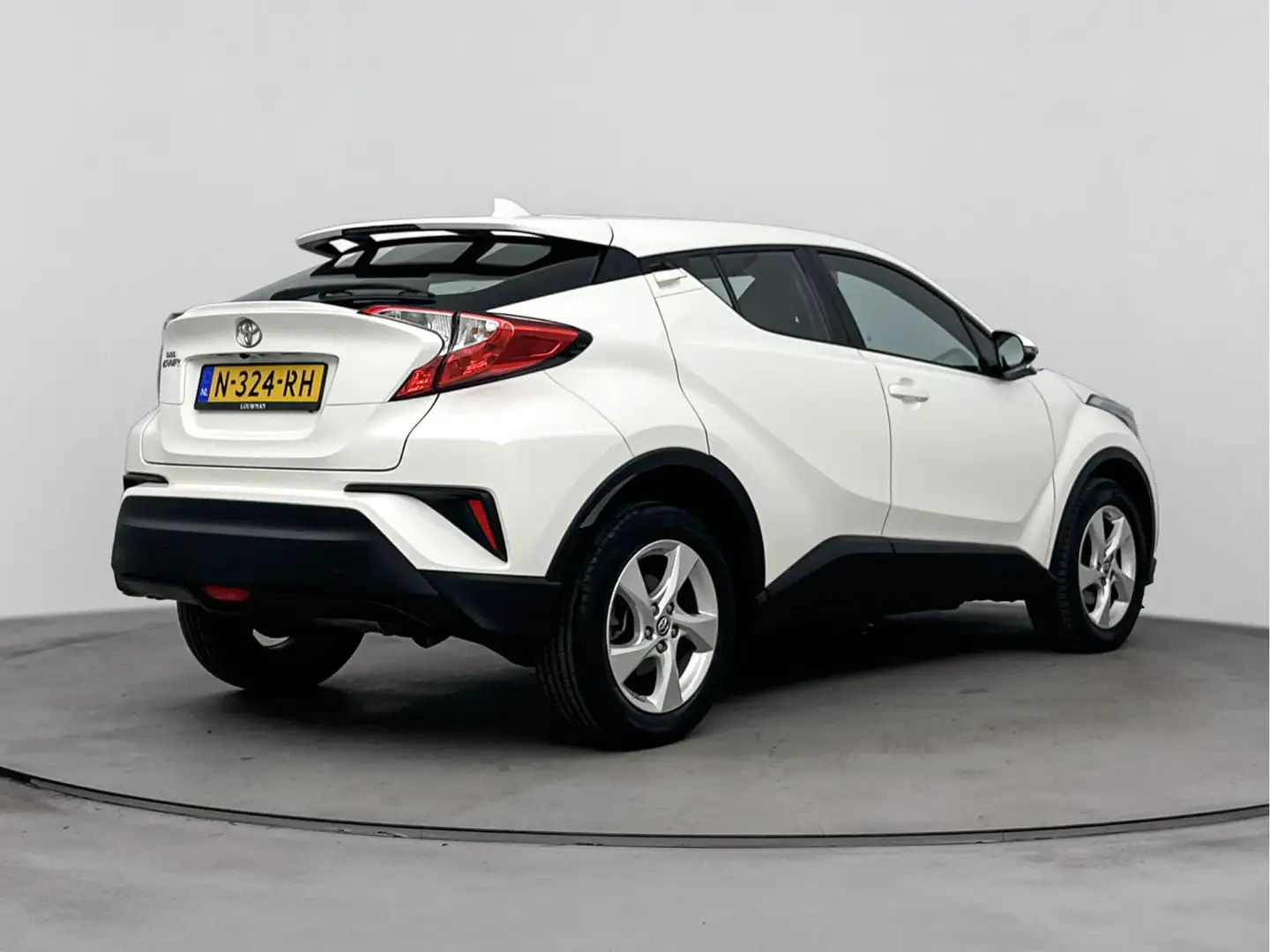 Toyota C-HR 1.2 Active | Garantie t/m 25-02-2029 mogelijk | Cl Wit - 2