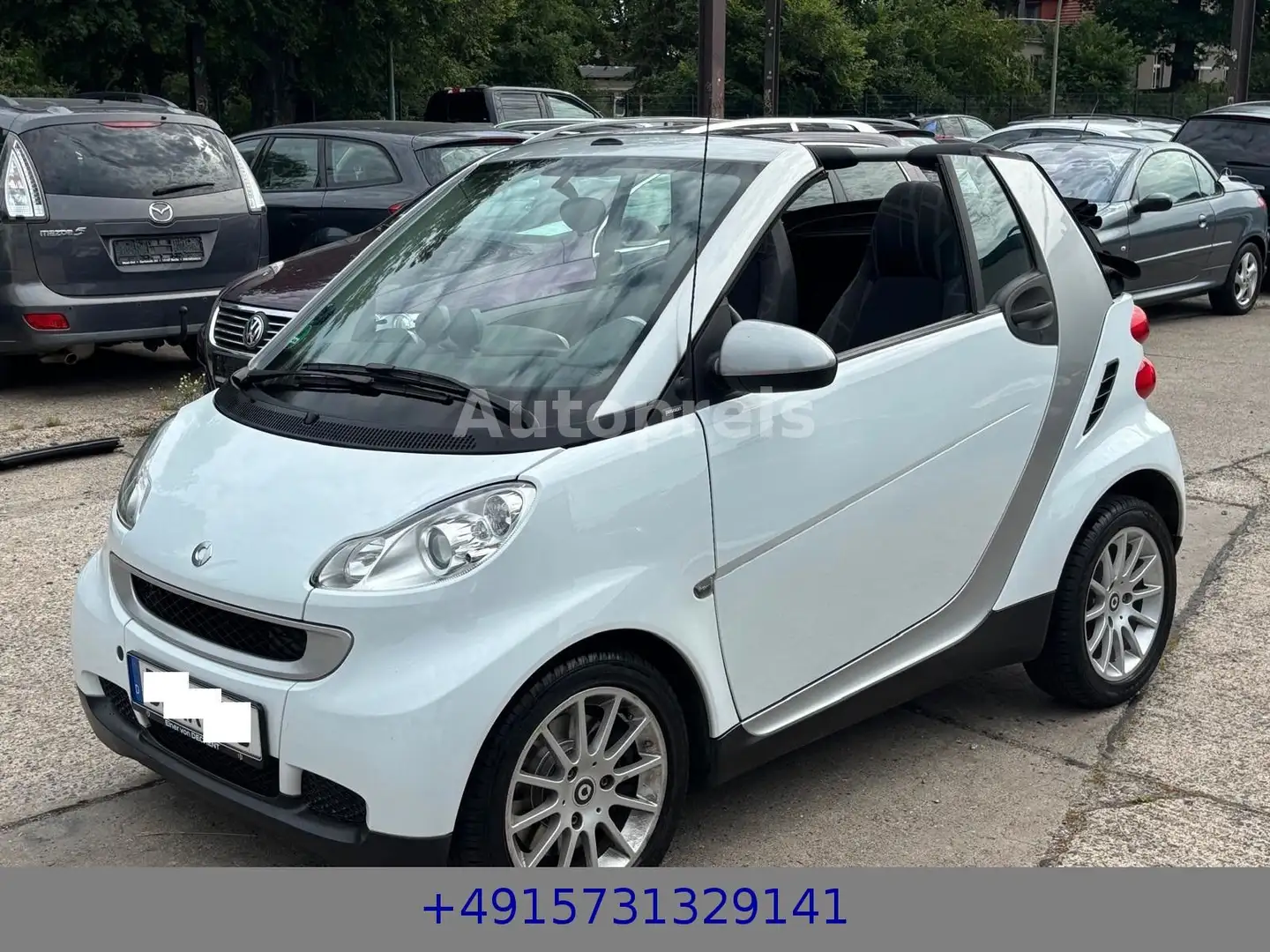 smart forTwo Cabrio 1.0 MHD Klima Automatik Kamera SHZ Weiß - 1