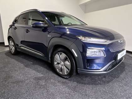 Hyundai KONA EV Fashion 64 kWh | Warmtepomp | Open Dak | Naviga