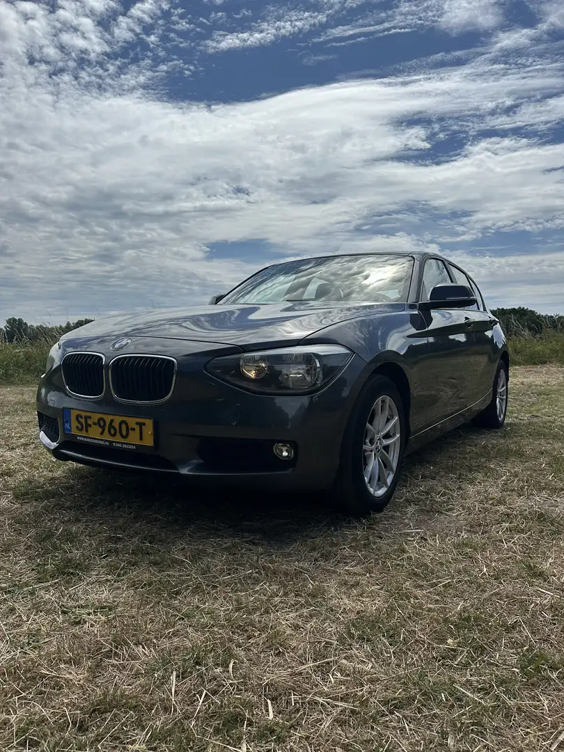 BMW 116 High Executive | Revisiemotor | APK 2026 Grijs - 1