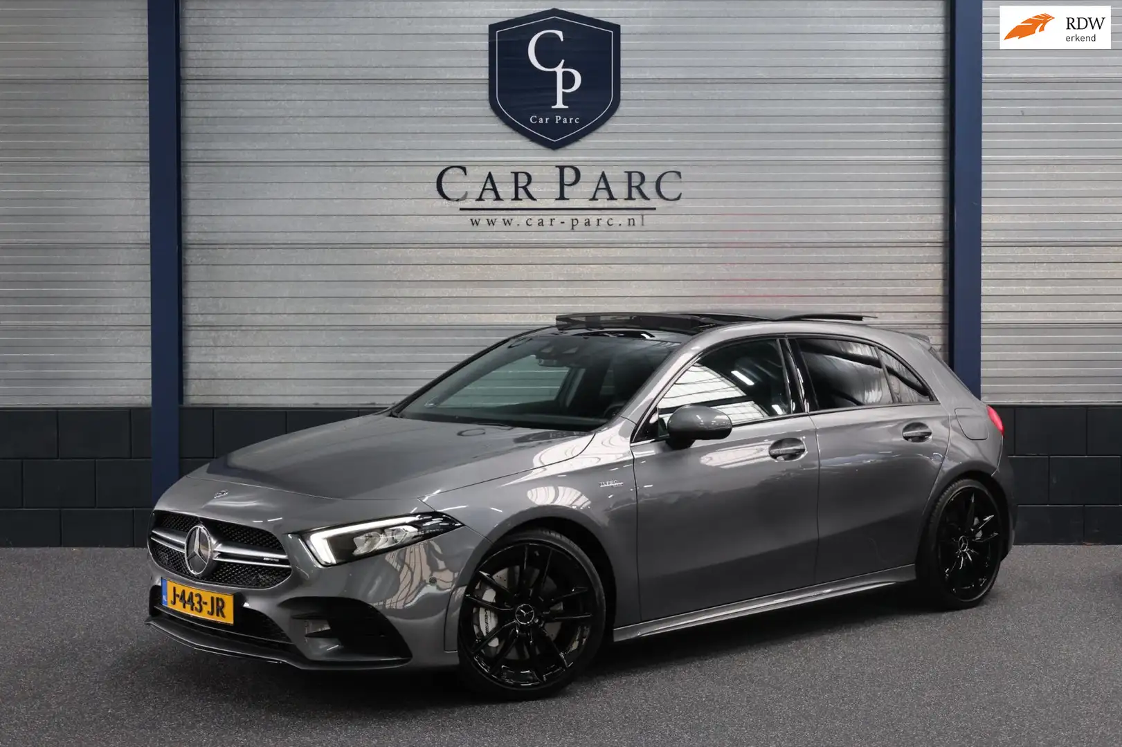 Mercedes-Benz A 35 AMG 4MATIC 306+PK LED/SFEER/VIRTUAL/PANO/HALF LEER+ALC Grijs - 1