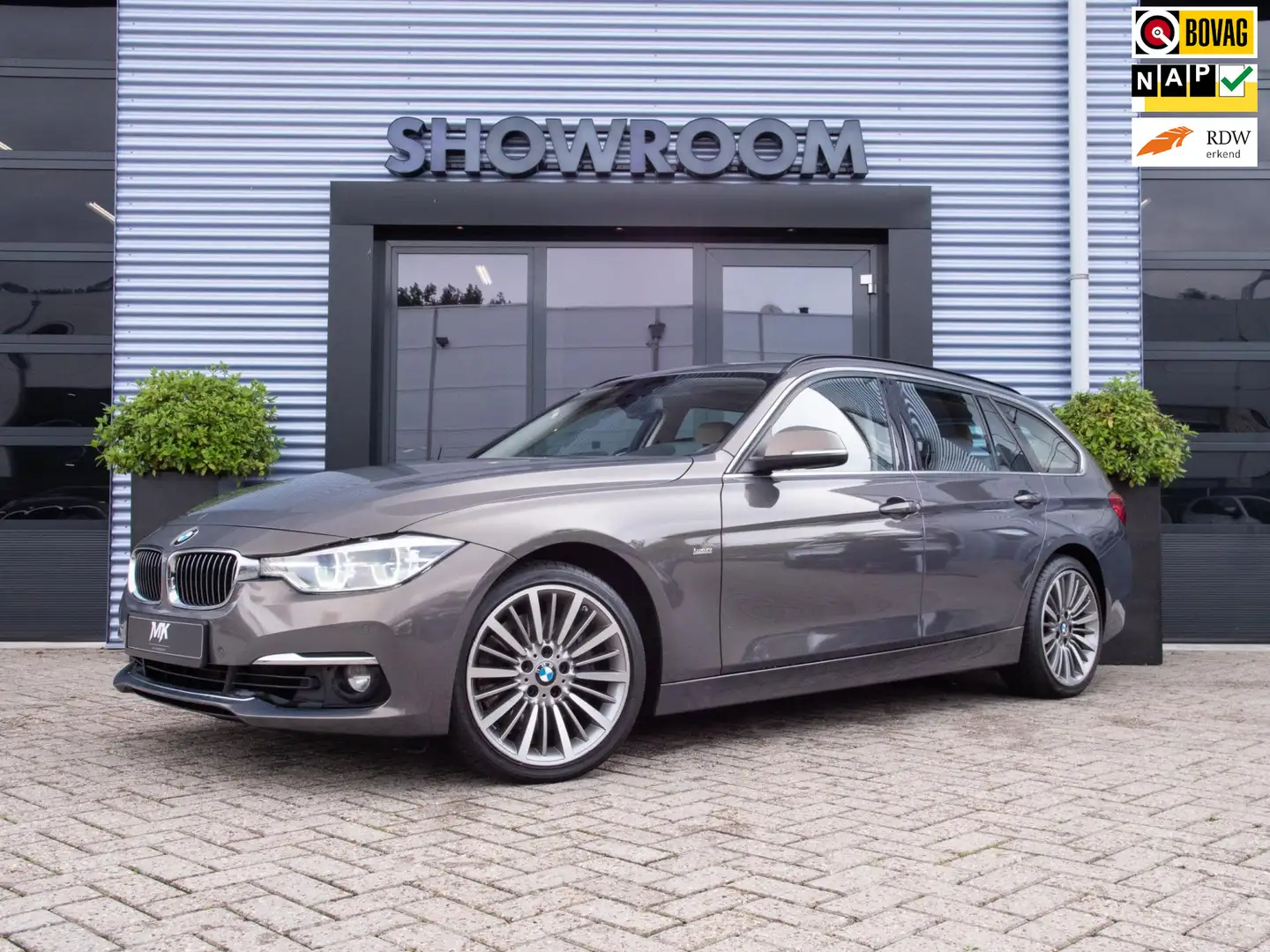BMW 335 3-serie Touring 335d xDrive Centennial High Execut Grijs - 1