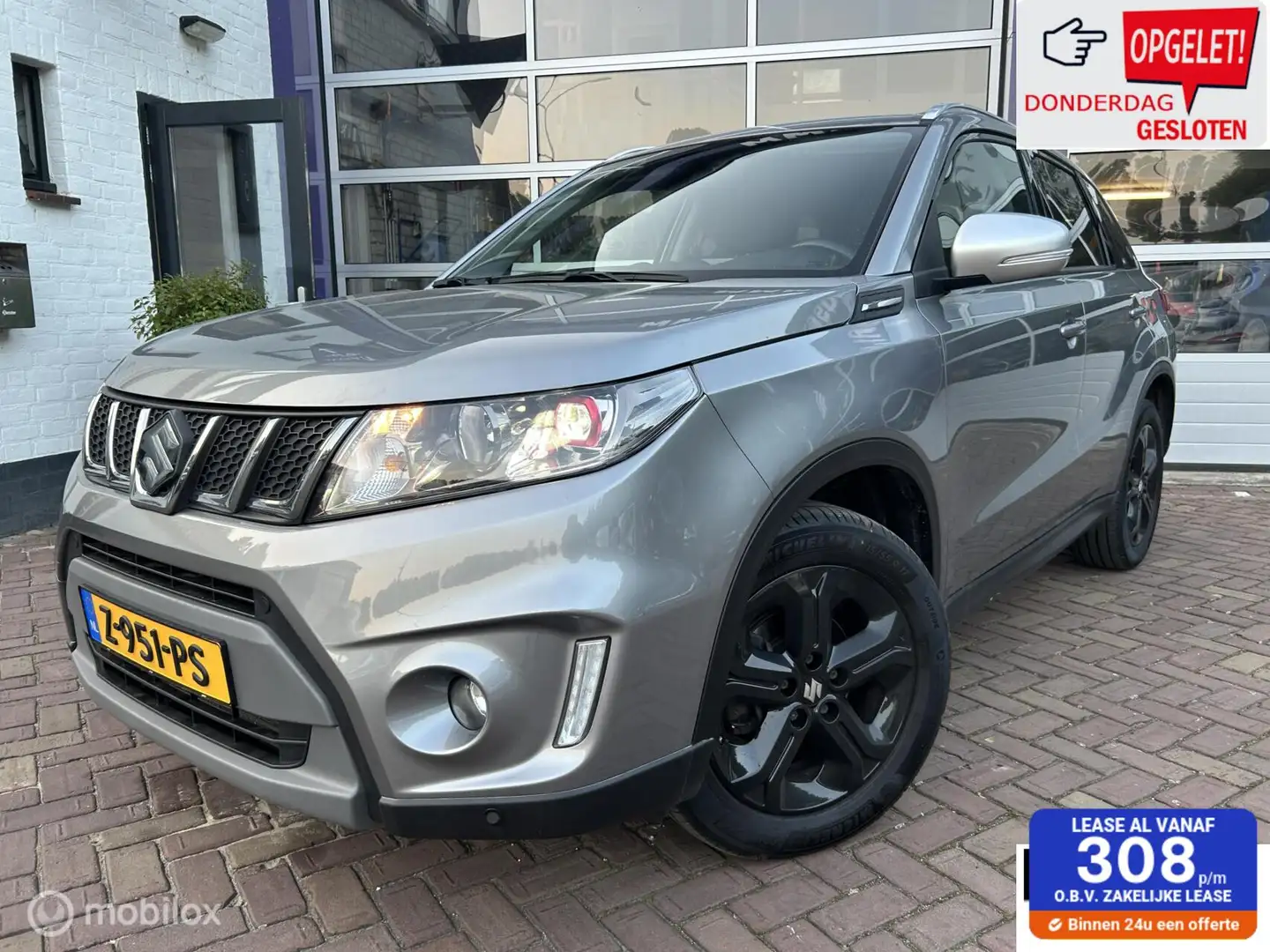 Suzuki Vitara 1.4 S Allgrip 4x4 AUTOMAAT * AIRCO * TREKHAAK Grijs - 1