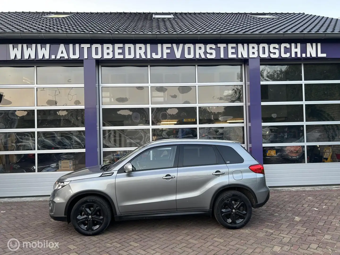 Suzuki Vitara 1.4 S Allgrip 4x4 AUTOMAAT * AIRCO * TREKHAAK Grijs - 2
