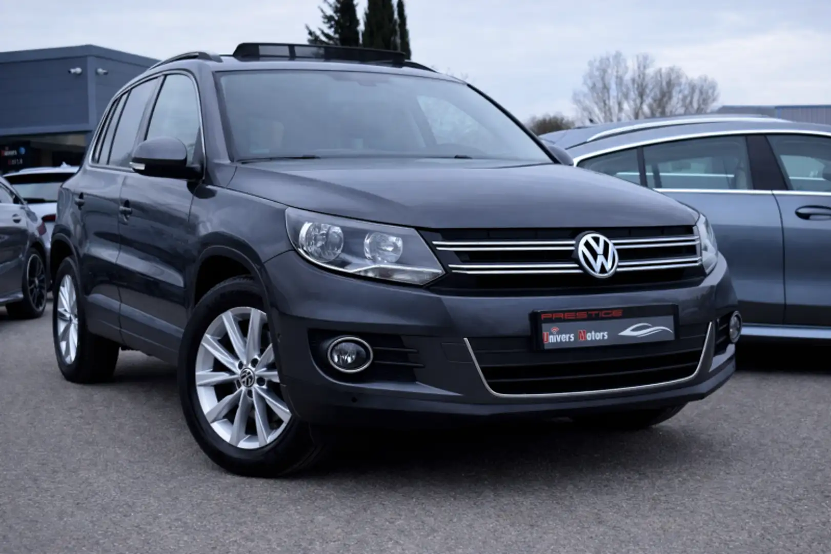 Volkswagen Tiguan 2.0 TDI 110CH BLUEMOTION TECHNOLOGY FAP SPORTLINE Gris - 1