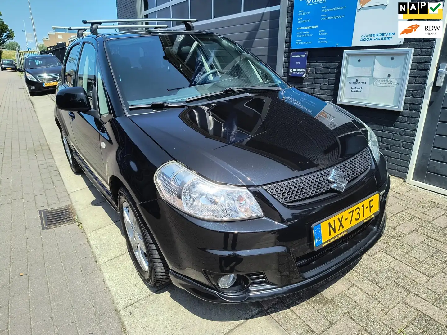 Suzuki SX4 1.6 Exclusive Arrow, nieuwe APK, beurt. Arrow uitv Zwart - 1