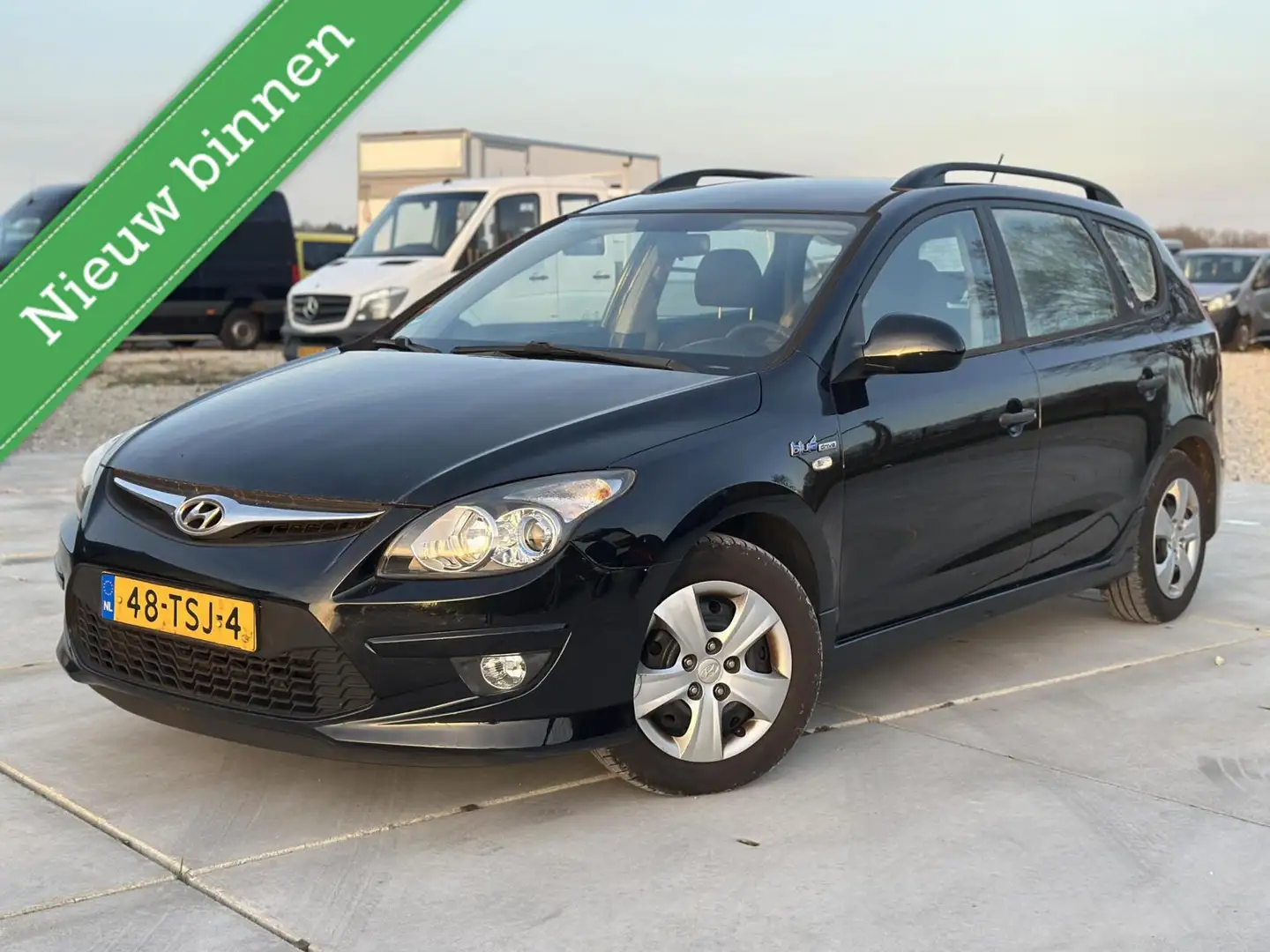 Hyundai i30 CW 1.4i i-Drive Cool AIRCO CRUISE.C TREKHAAK Zwart - 1