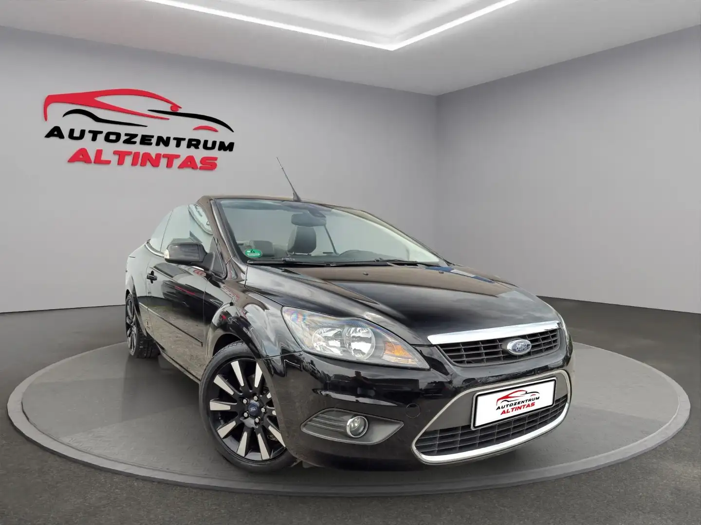 Ford Focus Cabrio Titanium*KLIMAAUT*107TKM*NAVI*SHZ* Schwarz - 1