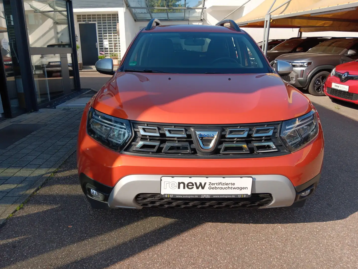Dacia Duster Prestige 4WD wenige KM Allwetter Oranje - 2