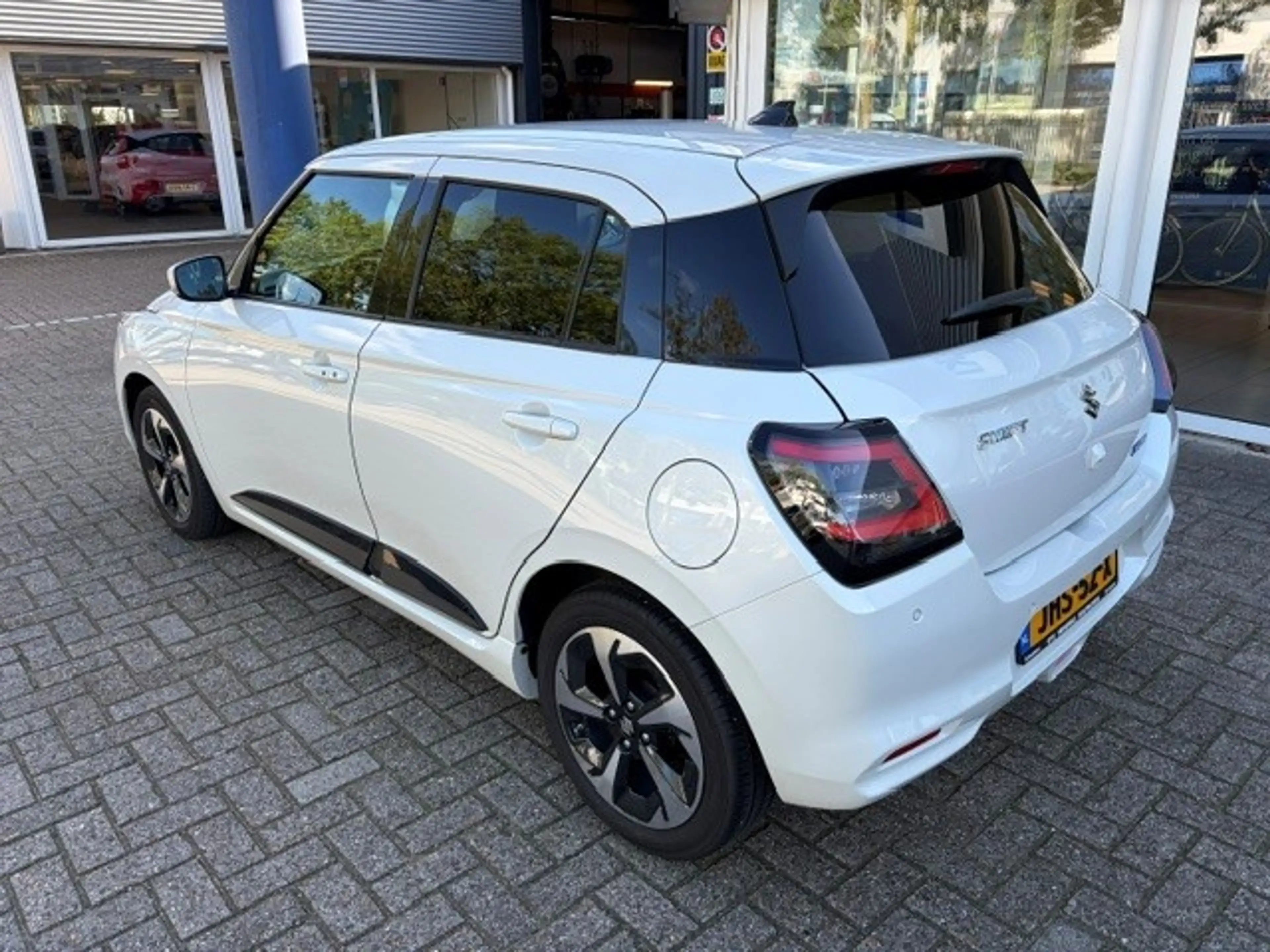 Suzuki Swift 1.2 Smart Hybrid Style (RIJKLAAR) 10 jaar garantie — photo 7