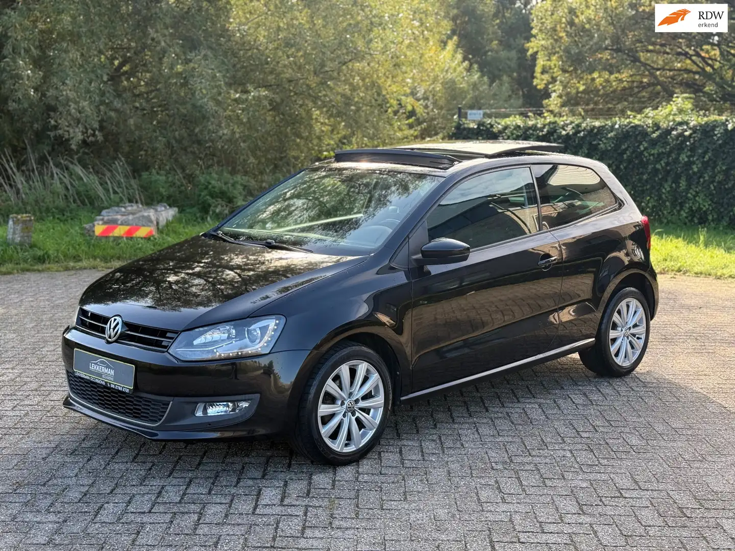 Volkswagen Polo 1.2 TSI Highline PANO I CRUISE I PDC I NIEUWE KETT Zwart - 1