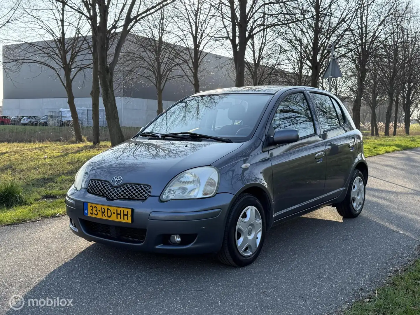 Toyota Yaris 1.3 VVT-i S-Line*NEW APK 3/27*AIRCO*ELEK. RAMEN Blau - 1