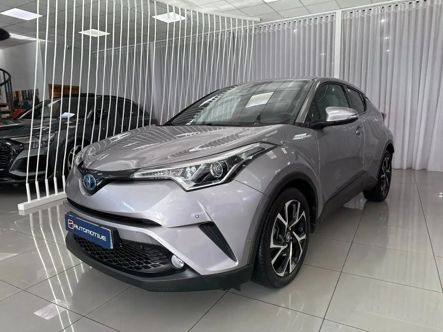 Toyota C-HR 125H Advance Grau - 1