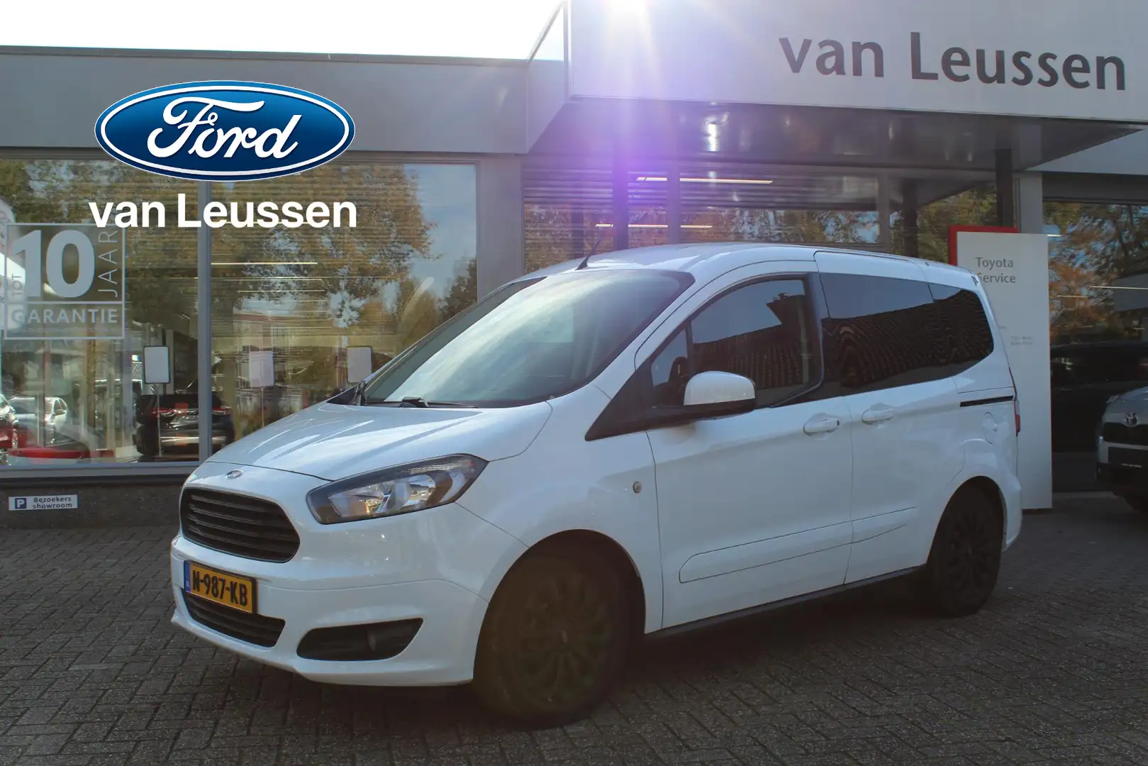 Ford Tourneo Courier TITANIUM 5-PERSOONS BENZINE TREKHAAK AIRCO CRUISE Blanc - 1