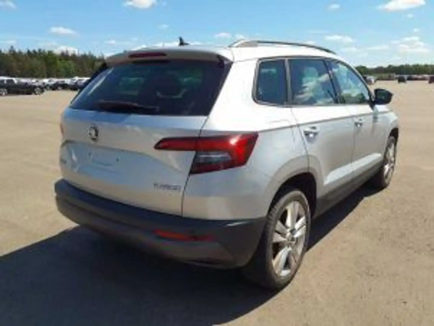 Skoda Karoq Style 1.5 TSI "LED/AHK/PDC/Navi/Sitzhzg" Zilver - 2