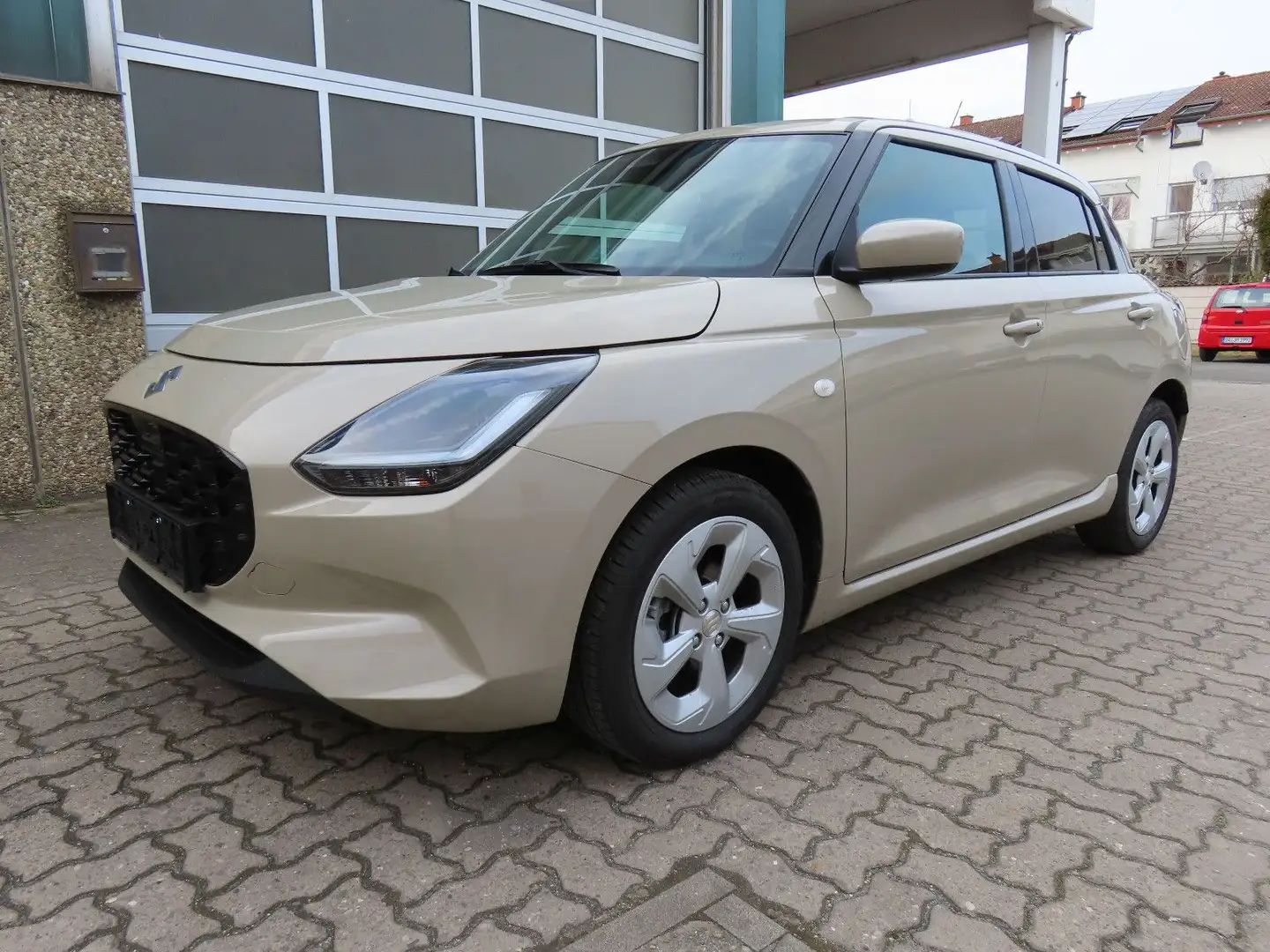 Suzuki Swift 1.2 Dualjet Hybrid 61 kW Comfort Beige - 1
