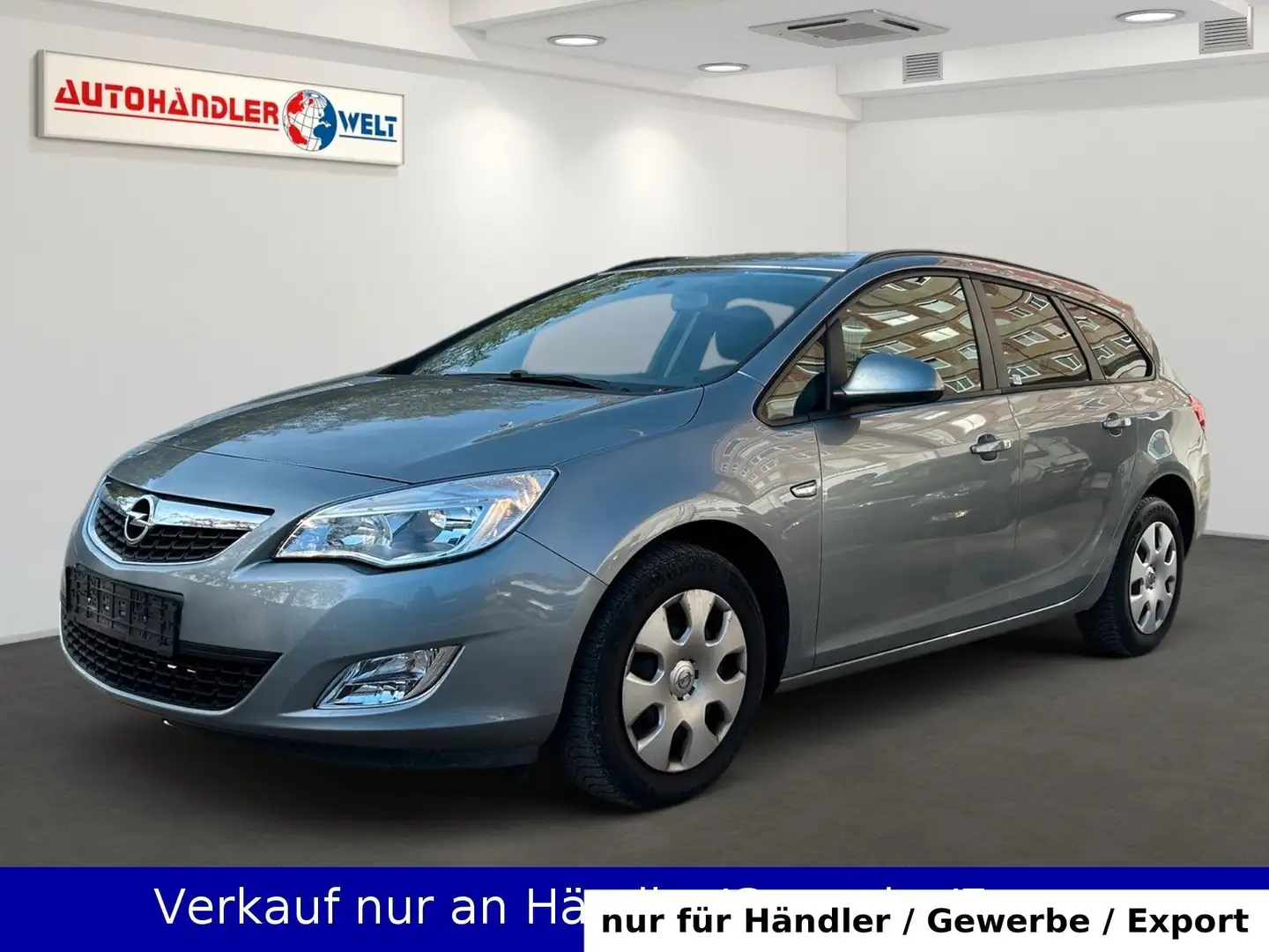 Opel Astra J Kombi 1.4i Klimaanlage SHZ PDC Silber - 1