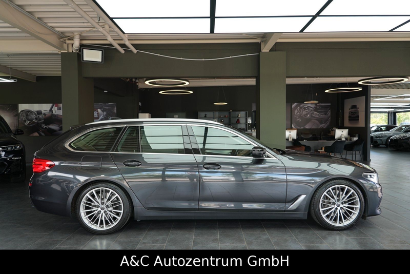 BMW 540 i Touring xDrive Sport Line — photo 8