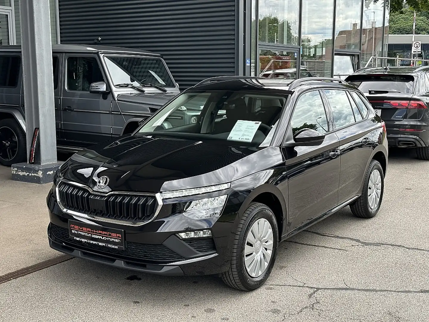 Skoda Kamiq 1,0 TSI Essence DSG Schwarz - 1