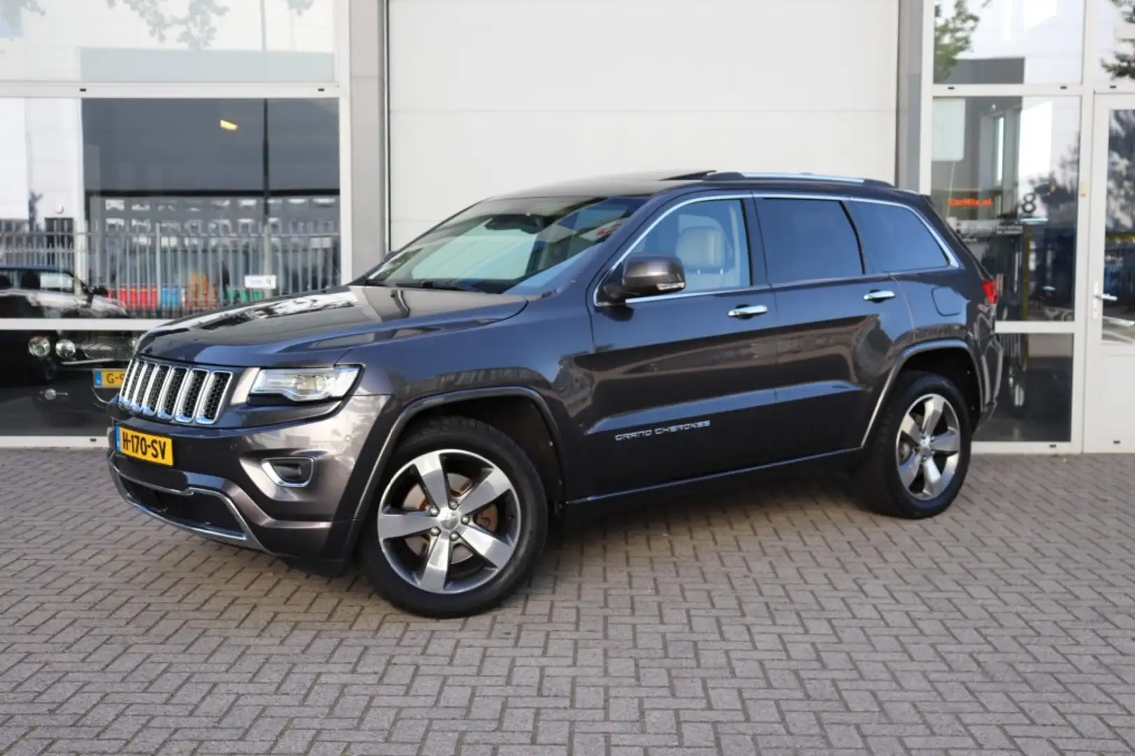 Jeep Grand Cherokee 3.0 CRD OVERLAND/STOEL.STUUR.VERW/STOEL.VENT/ADAP. Grijs - 1
