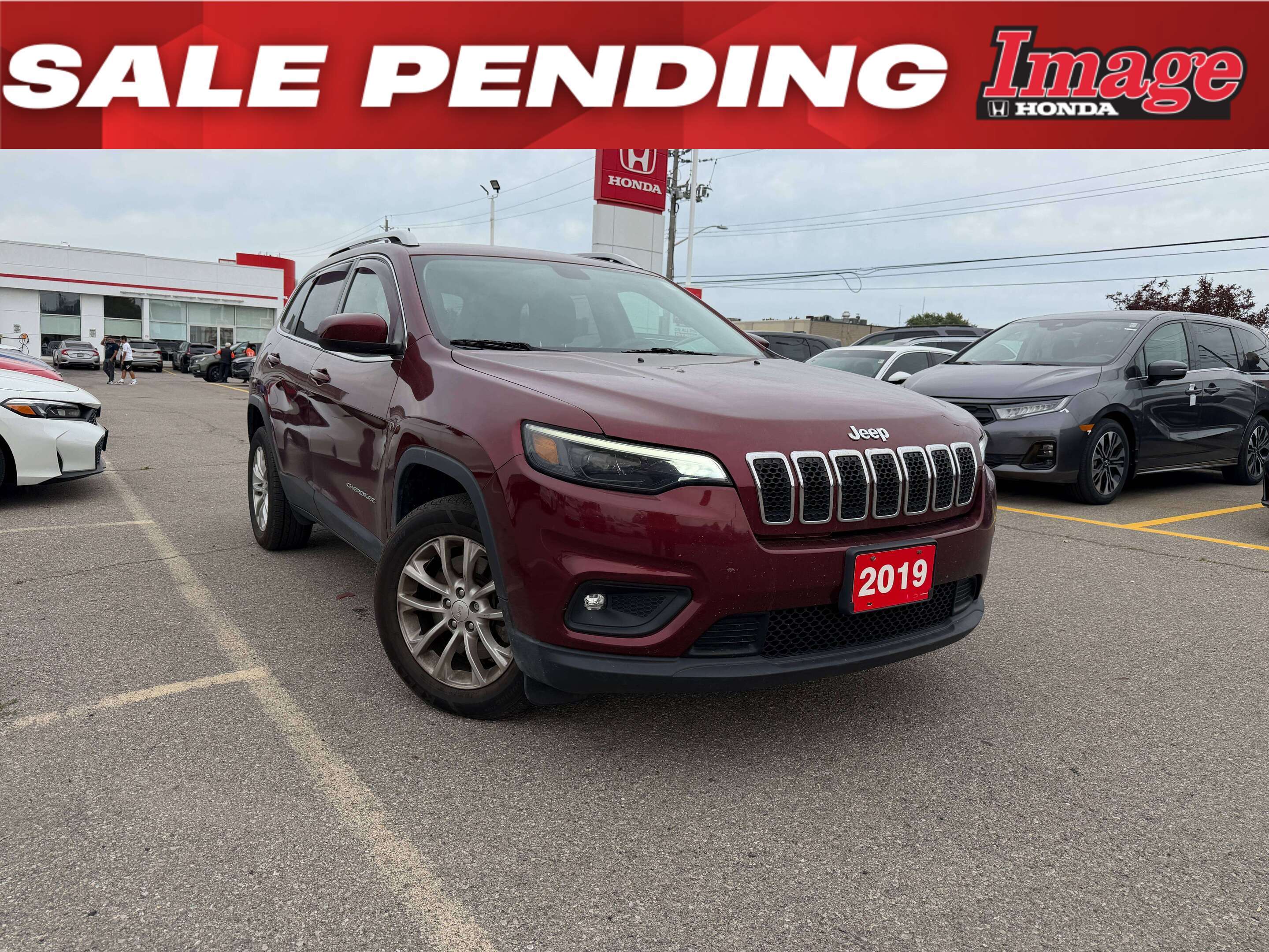 Red 2019 Jeep Cherokee SUV / Crossover  9-Speed Automatic