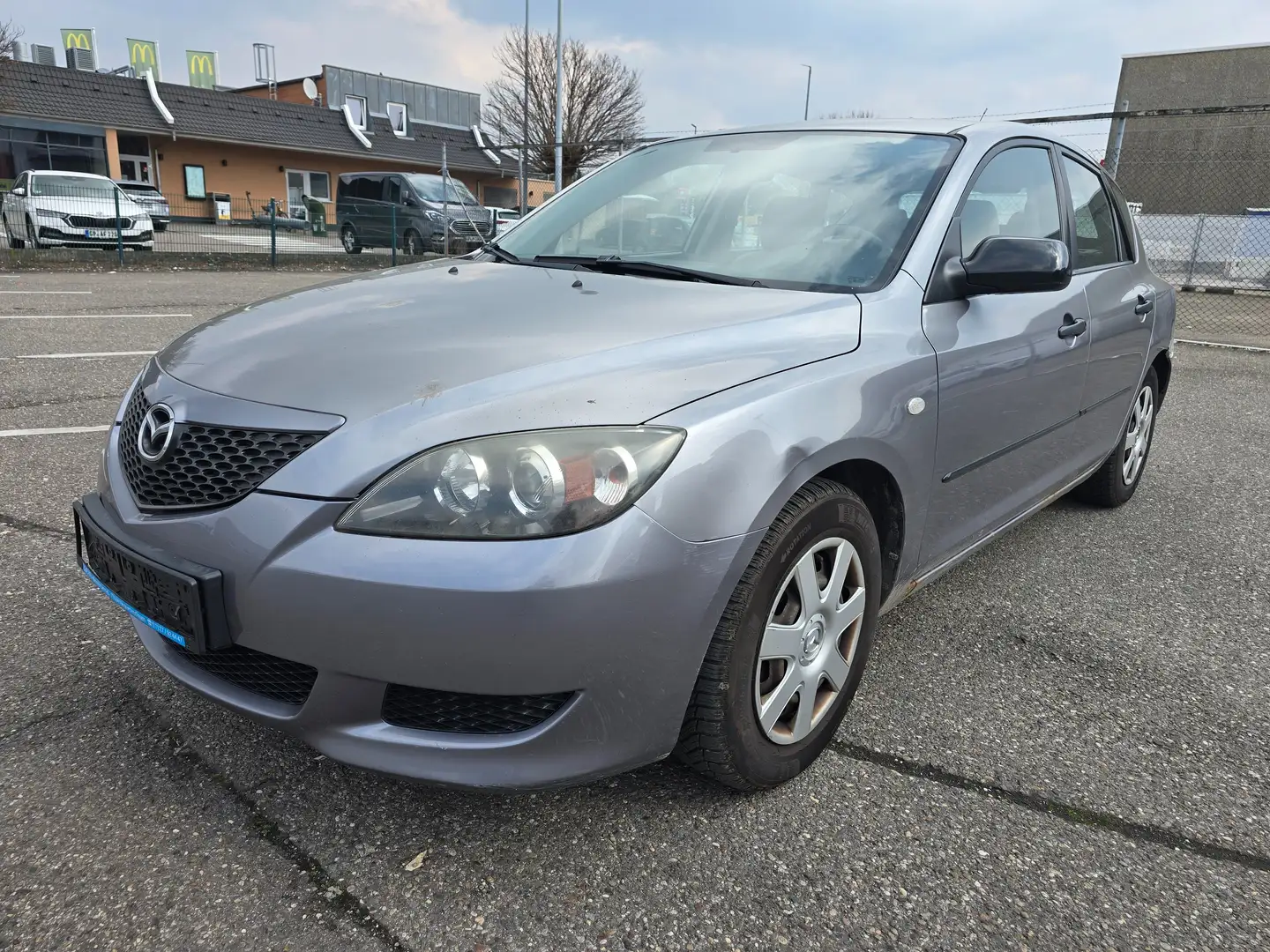 Mazda 3 3 Fließheck 1.4 Sport Comfort TÜV bis 3.2027 Grau - 1