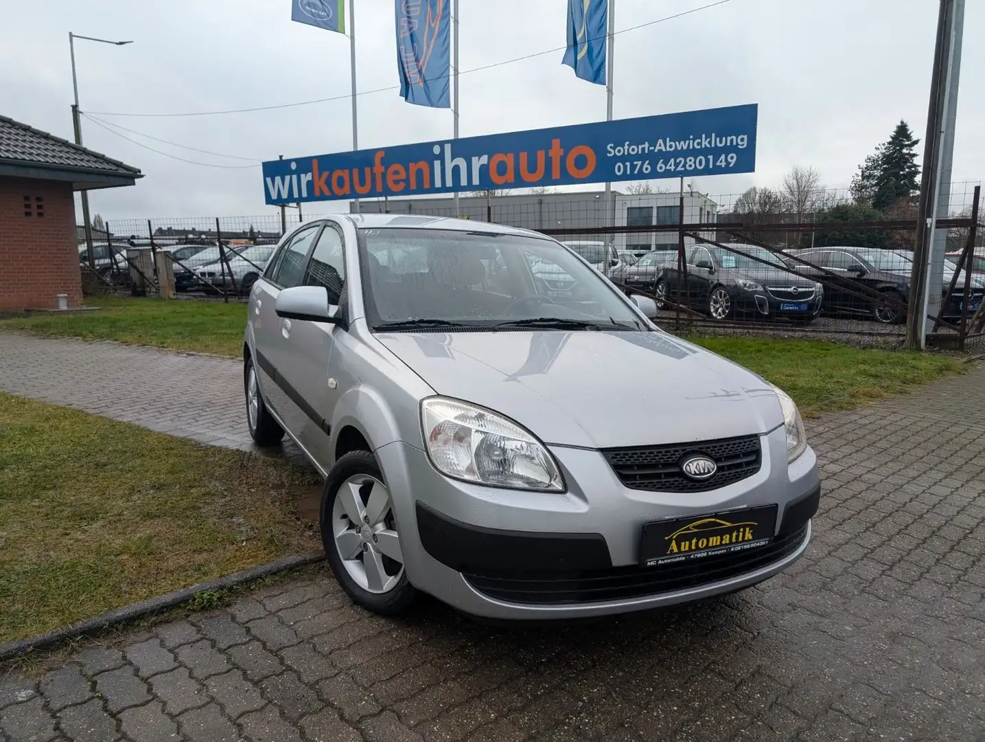 Kia Rio 1.6 CVVT Spirit*AUTOMATIK*RADIO-CD*ZV-FUNK ! Plateado - 1