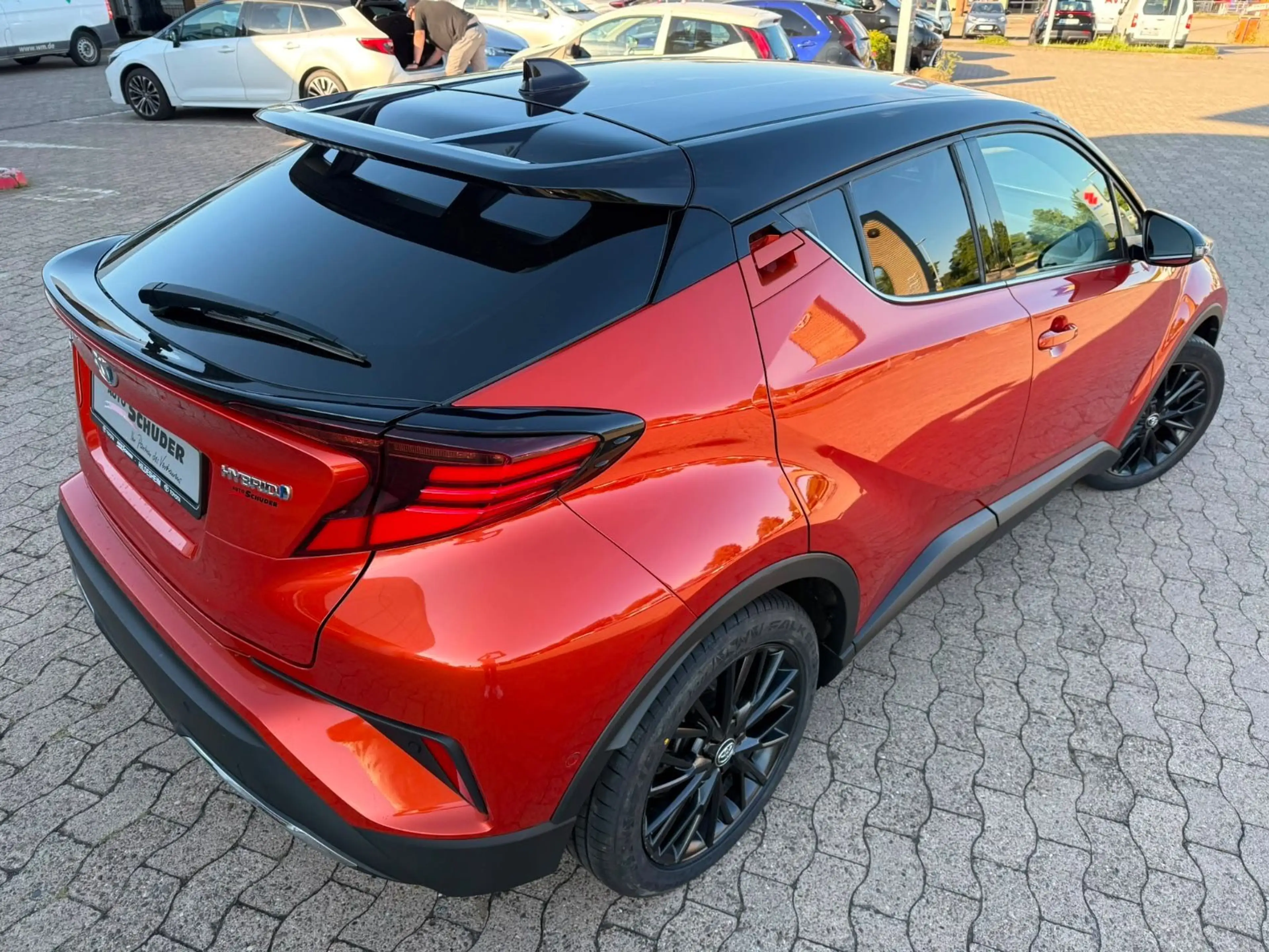 Toyota C-HR Hybrid Orange Edition **JBL** — photo 7