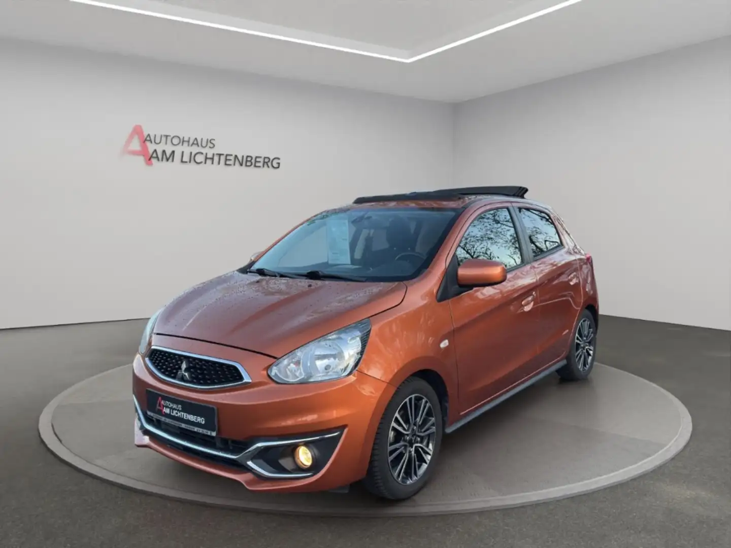 Mitsubishi Space Star 1,2 Edition 100+ mit Faltschiebedach NAVI+SITZHEIZ Orange - 1