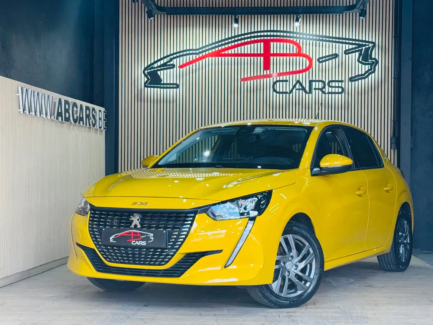 Peugeot 208 1.2i * GARANTIE 12 MOIS * 1ER PROP * Jaune - 1