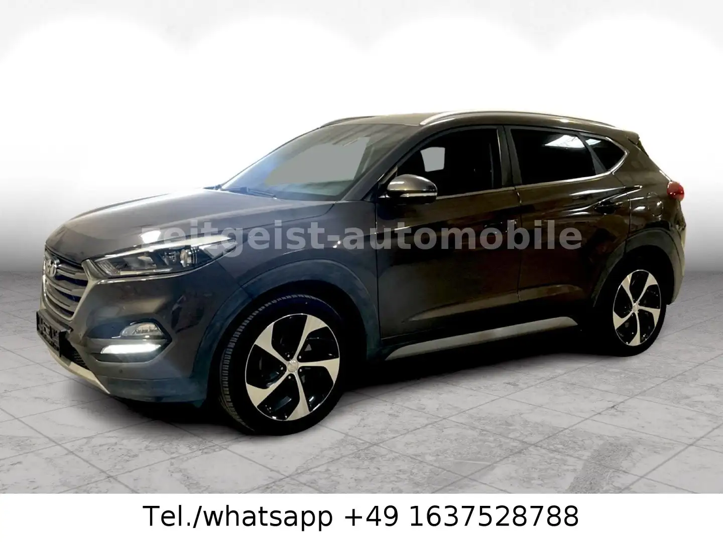 Hyundai TUCSON IX35*LEDER*CAM*M+S*TÜV NEU Grijs - 1