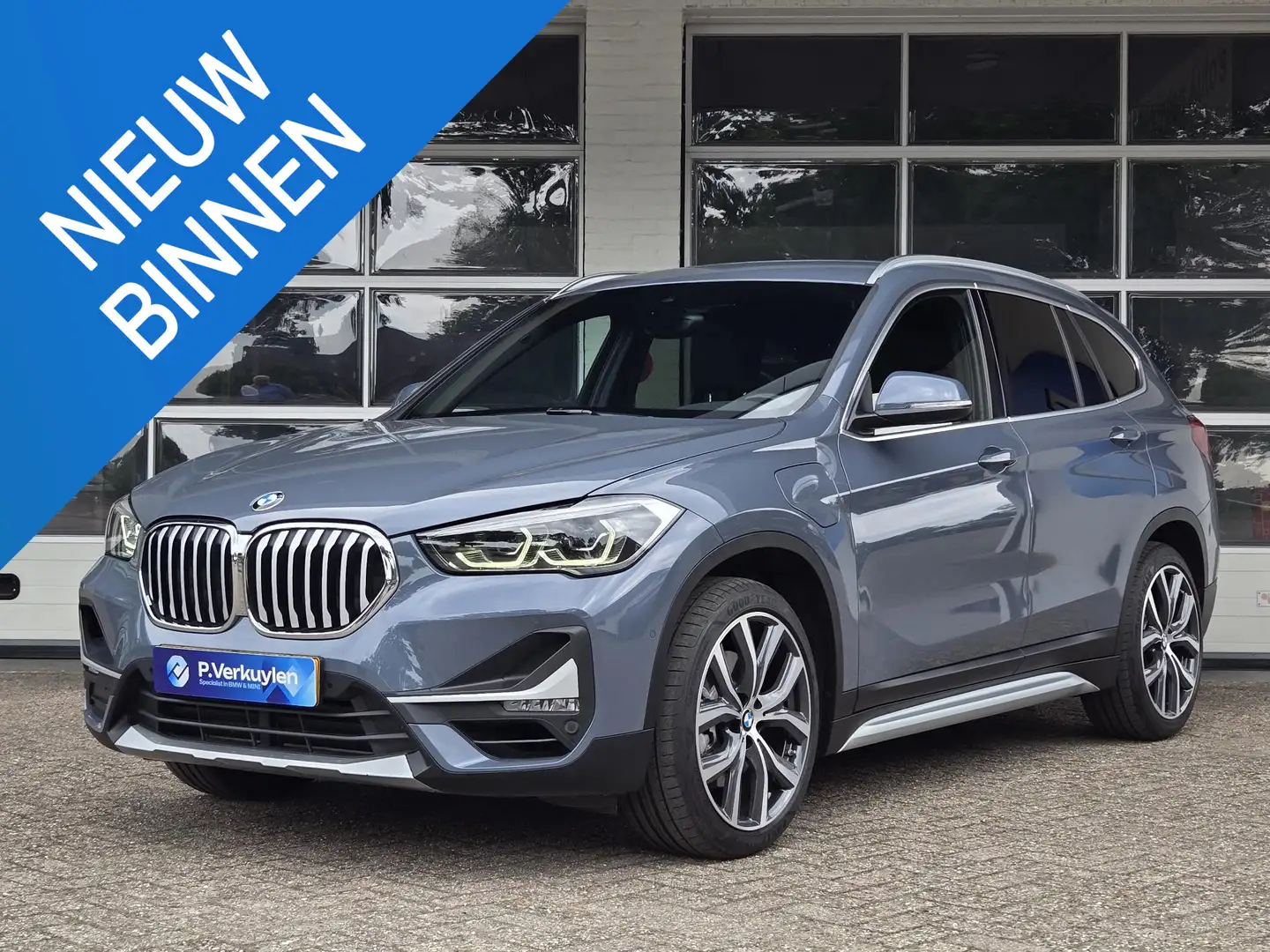 BMW X1 xDrive25e X line | 19 INCH LM VELGEN | SPORTSTOELE Grijs - 1
