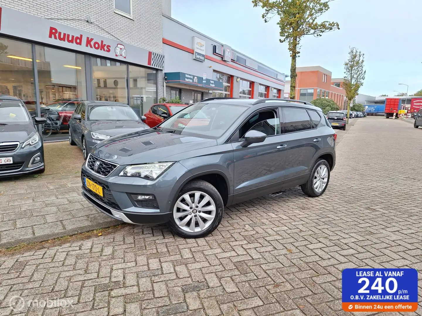 SEAT Ateca 1.0 ECOTSI STYLE BUSINESS INTENSE / Carplay / Park Grijs - 1