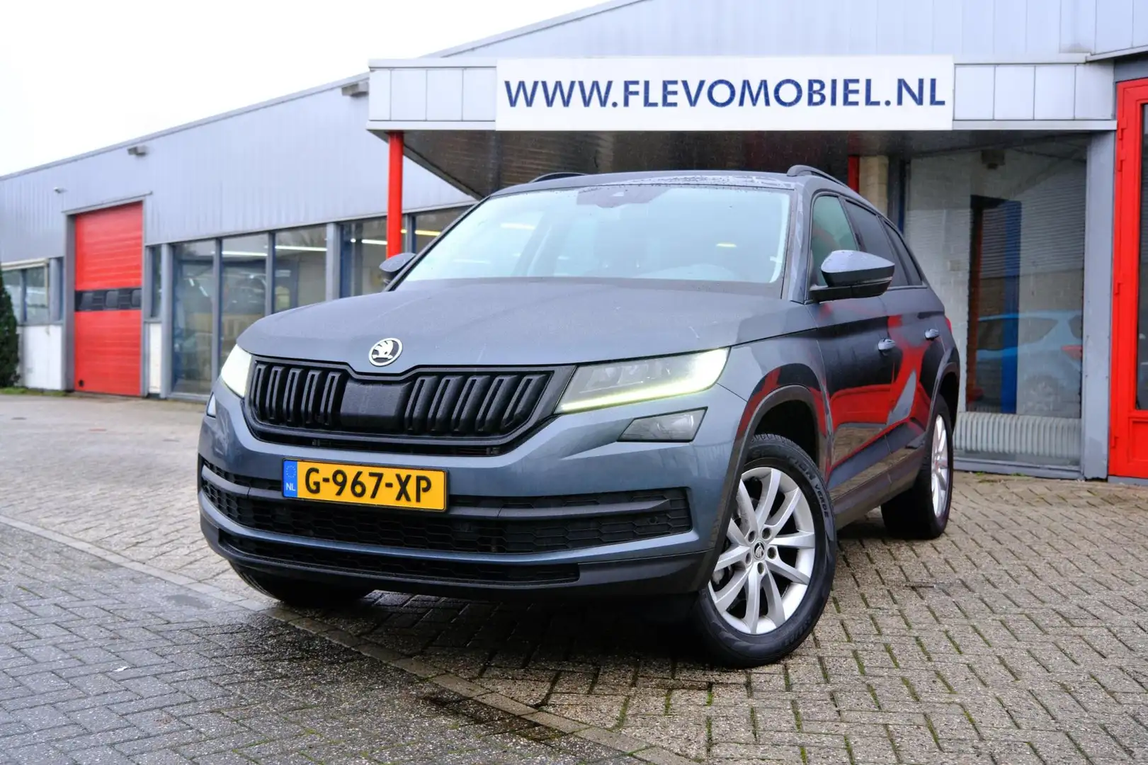 Skoda Kodiaq 1.5 TSI Business Edition 7-pers Aut. Navi|Adapt-Cr Grijs - 1